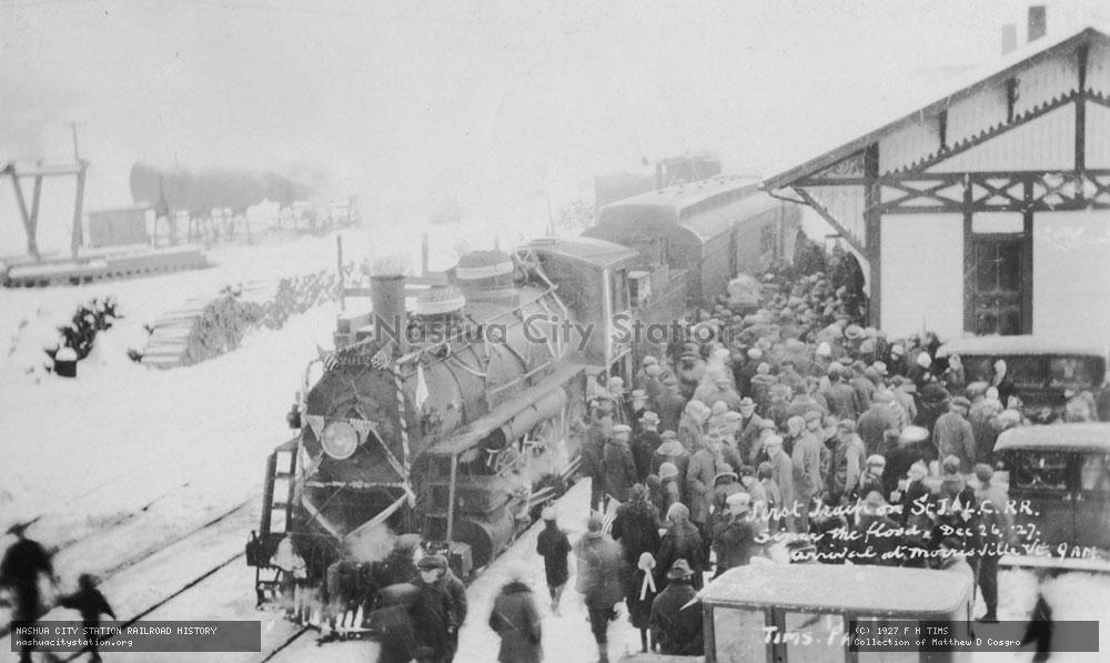 Postcard: First train on St. Johnsbury & Lake Champlain Railroad since the flood, December 26, 1927, arrival at Morrisville, Vermont, 9 AM